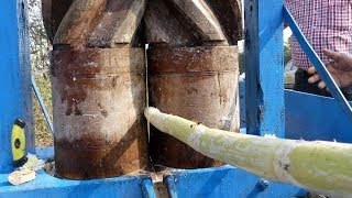 Wooden Crushed Sugarcane Juice  Sugarcane Juice Freshly Made the Ancient Way  Oldest Streetfood [upl. by Ibocaj337]