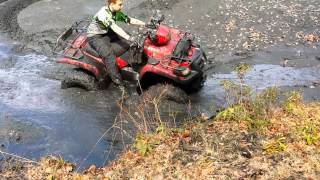 2003 Suzuki Vinson water and mud riding stuck [upl. by Ibbed]