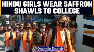 Ktaka Hindu girls wear saffron scarves to protest against Hijab  Oneindia News [upl. by Adlee]