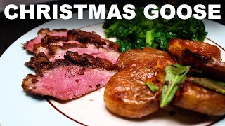 Roast goose with Christmas spices black cherry gravy goosefat roast potatoes and mustard greens [upl. by Ydaj]