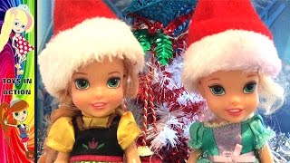 Anna and Elsa Toddlers Christmas Decorating The Christmas Tree  Christmas Carols  Toys In Action [upl. by Akayas819]