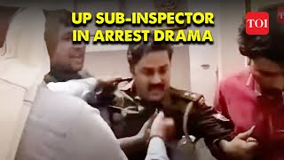 On cam ACB sleuths arrest UP cop for taking bribe drag him through public road [upl. by Strep544]