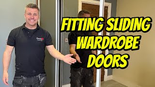 Fitting Sliding Wardrobe Doors  DIY Project [upl. by Reve409]