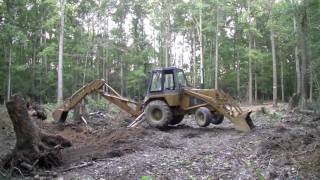 Case 580C Backhoe  Digging out three big stumps  Part 2 HD [upl. by Anairdna]